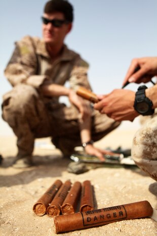UDAIRI RANGE, Kuwait (July 31, 2012) - Reconnaissance Marines with Battalion Landing Team 1st Battalion, 2nd Marine Regiment, 24th Marine Expeditionary Unit, use dynamite to make explosive charges during basic demolitions training at Udairi Range in Kuwait, July 31, 2012. The Marines are in Kuwait as part of a 24th MEU sustainment training package. The 24th MEU is deployed with the Iwo Jima Amphibious Ready Group as a U.S. Central Command theater reserve force providing support for maritime security operations and theater security cooperation efforts in the U.S. 5th Fleet area of responsibility. (Official Marine Corps Photos by Sgt. Richard Blumenstein) 