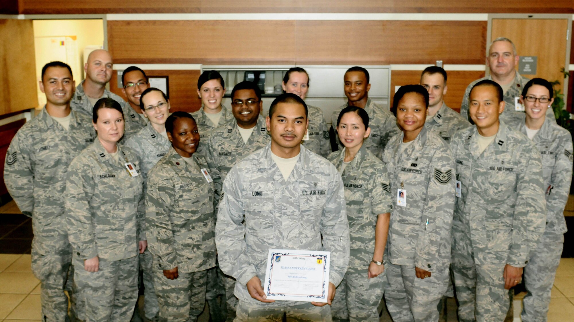 ANDERSEN AIR FORCE BASE, Guam— Senior Airman Andrew Long, 36th Medical Group aerospace medical technician, was awarded Team Andersen’s Best August 16. Team Andersen's Best is a recognition program which highlights a top performer from the 36th Wing. Each week, supervisors nominate a member of their team for outstanding performance and the wing commander presents the selected Airman/civilian with an award. To nominate your Airman/civilian for Andersen's Best, contact your unit chief or superintendent explaining their accomplishments. (U.S. Air Force photo by Airman 1st Class Mariah Haddenham/Released)