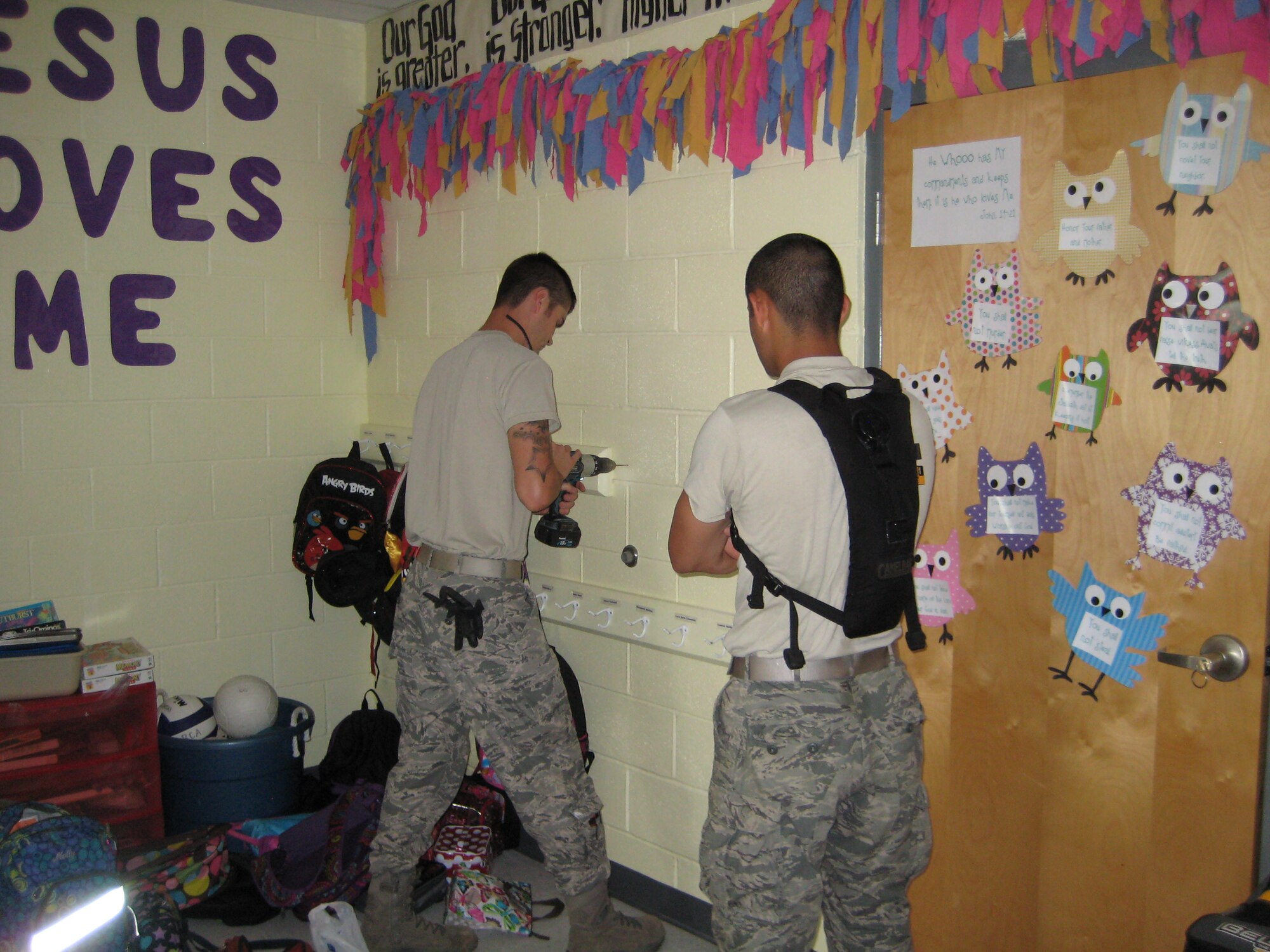Members of the 477th Civil Engineer Squadron work to rebuild the Riverside Christian Academy’s field house in Fayetteville, Tenn. Aug. 10. This service project is a part of Air Force Reserve Commands Innovative Readiness Training that provides an opportunity for unit members to get hands-on training in their career field to enable upgrades and promotions. (Courtesy Photo) 