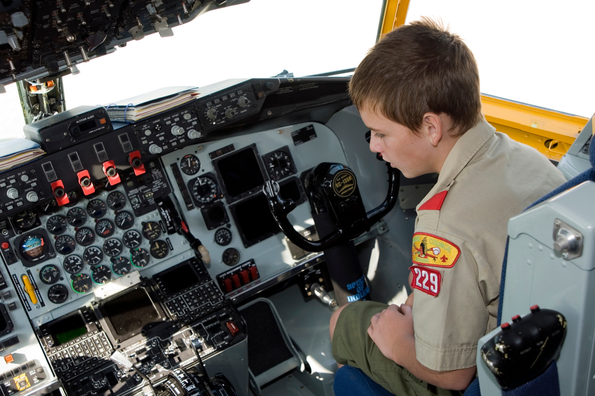 GRISSOM AIR RESERVE BASE, Ind. -- A Boy Scout from Troop 229 looks at the controls in the cockpit of a KC-135R Stratotanker during a base tour July 25. The Boy Scouts also visited the 434th Operations Support Squadron and the Grissom Fire Department to learn about the diverse jobs performed on base. (U.S. Air Force photo/Senior Airman Andrew McLaughlin)
