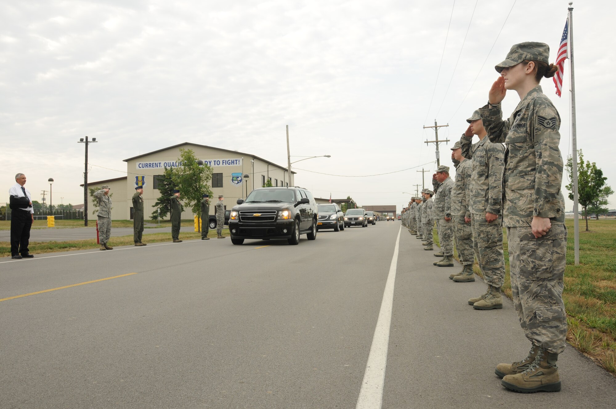 The men and women of the Niagara Falls Air Reserve Station salute the arrival of Secretary of Defense Leon E. Panetta August 9, 2012.  This was the first such visit to the air base by the Department of Defense's highest ranking official.  (U.S. Air Force photo by Jessica Mae Snow)