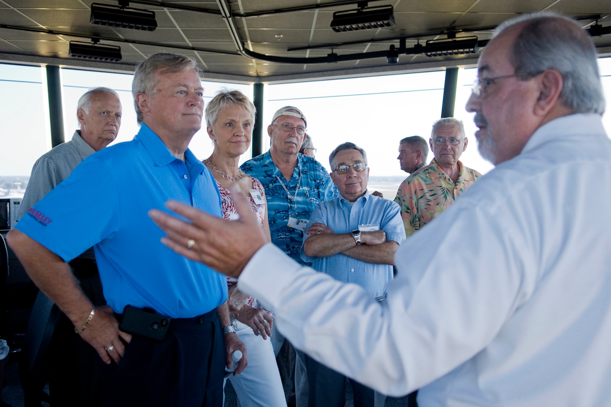 GRISSOM AIR RESERVE BASE, Ind. -- Bob Ulibarri, 434th Operations Support Squadron airfield operations manager, highlights the improvements Grissom's new $7.4 million air traffic control tower has over the old tower to Grissom Community Council members during a tour of the new tour here Aug. 3. The new tower offers more space for state-of-the-art equipment, is fully climate controlled, is two stories taller than the old tower, and is located inside Grissom's perimeter offering greater security. (U.S. Air Force photo/Tech. Sgt. Mark R. W. Orders-Woempner)