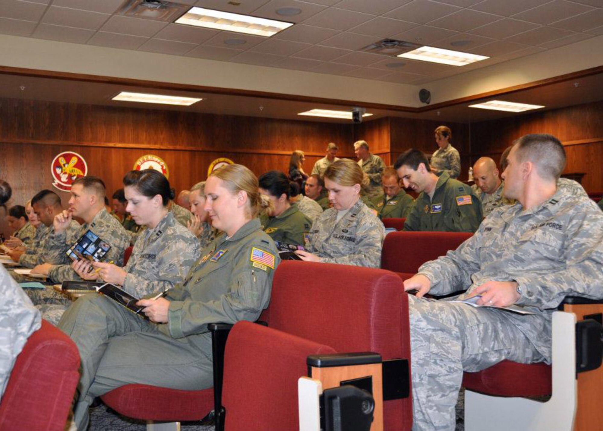 U.S. Air Force Reserve officers review course material during the Junior Officer Leadership Development course held Aug. 2-5, 2012, at Travis Air Force Base, Calif. The course, hosted by the 349th Air Mobility Wing, included briefings from Air Force Reserve leaders. (U.S. Air Force photo by Maj. Torri Crosby/Released)