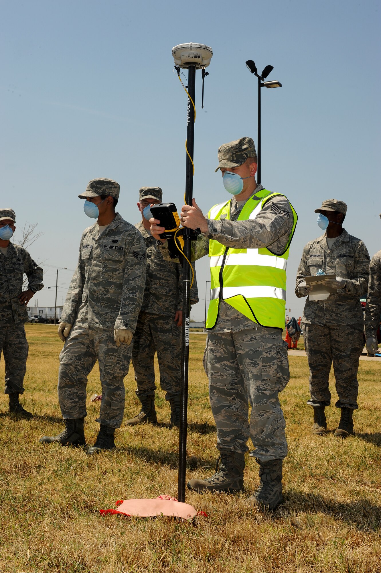 Staff Sgt. Ryan Lynn, 22nd Civil Engineer Squadron geospatial operations NCO in charge, records coordinates of “simulated findings” during a major accident response exercise Aug. 15, 2012, Wichita, Kan. The MARE is a way to test Team McConnell’s ability to respond to various emergency scenarios. (U.S. Air Force photo/Airman 1st Class Jose L. Leon)