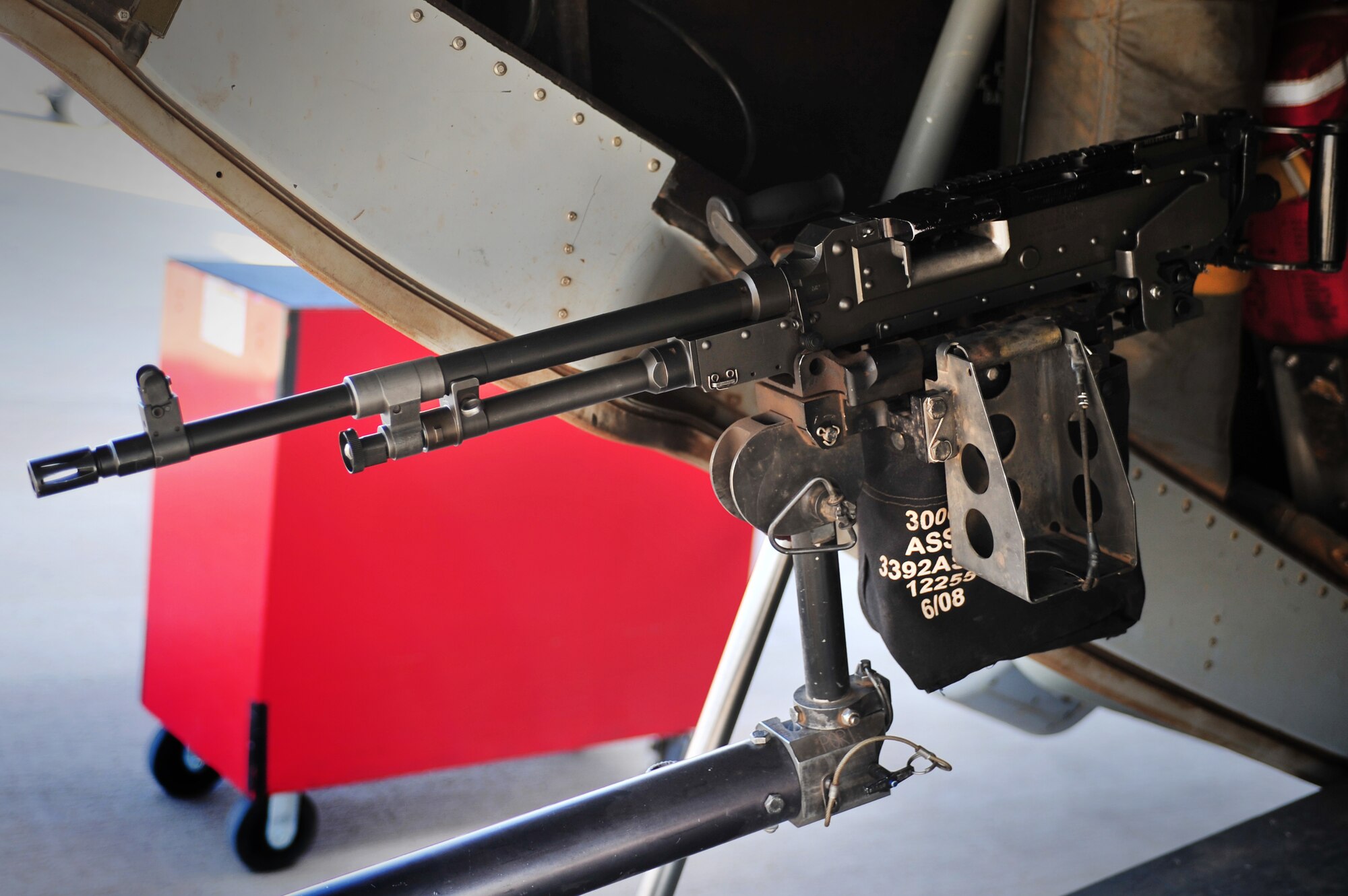 An inspected and cleared weapon is mounted on a CV-22 Osprey on the flightline at Cannon Air Force Base, N.M., July 5, 2012. Armament troops handle disassembling, cleaning, lubing and inspecting weaponry for their assigned aircraft at Cannon. (U.S. Air Force photo/Airman 1st Class Alexxis Pons Abascal)  