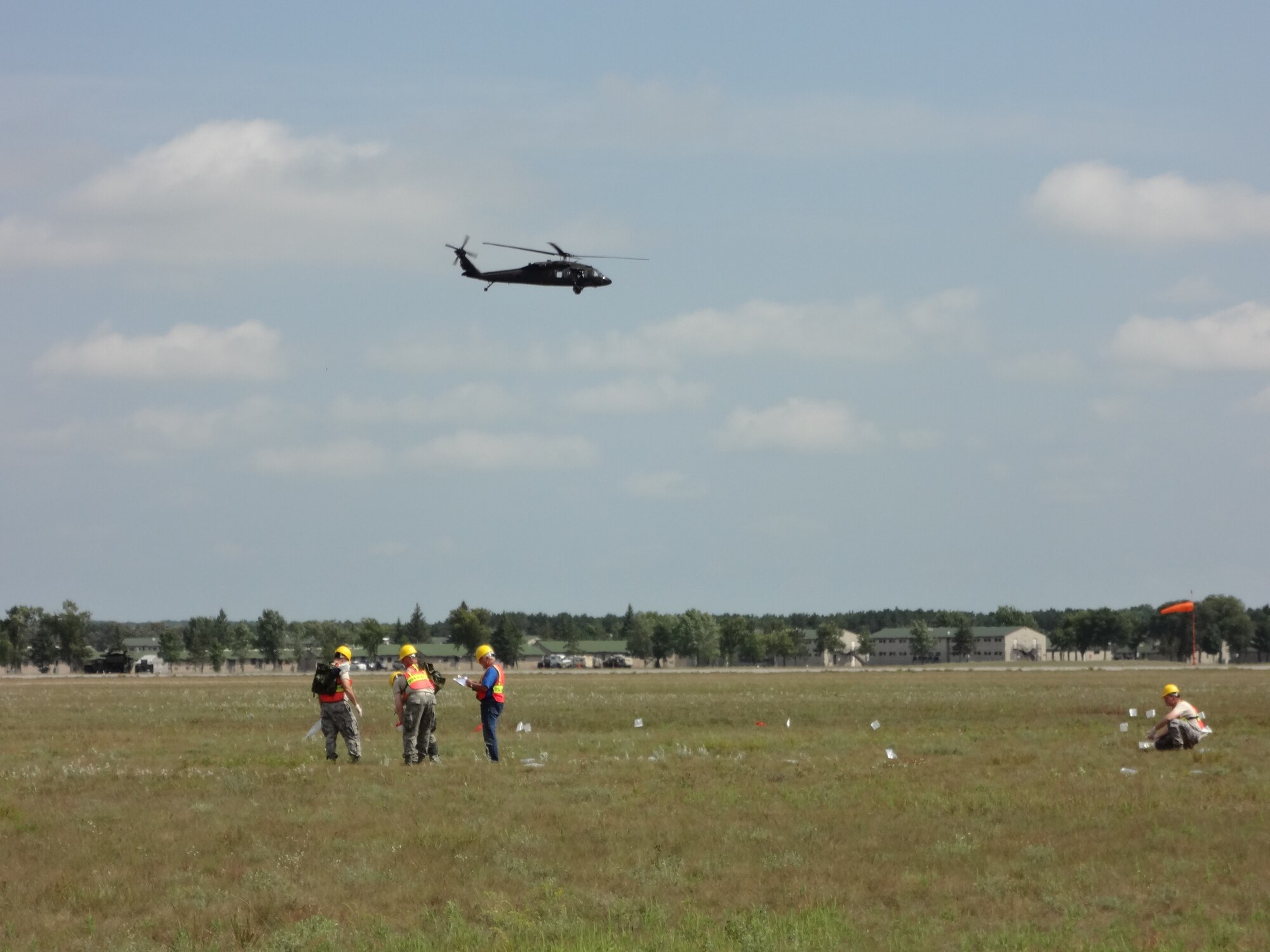 Members of the 934th Force Support Squadron search for and tag remains from a simulated aircraft accident as part of a Major Accident Response Exercise at Camp Ripley, Minn. The Aug. 15 exercise tested the 934th Airlift Wing's ability to respond to an off base aircraft accident. (Air Force Photo/Paul Zadach)