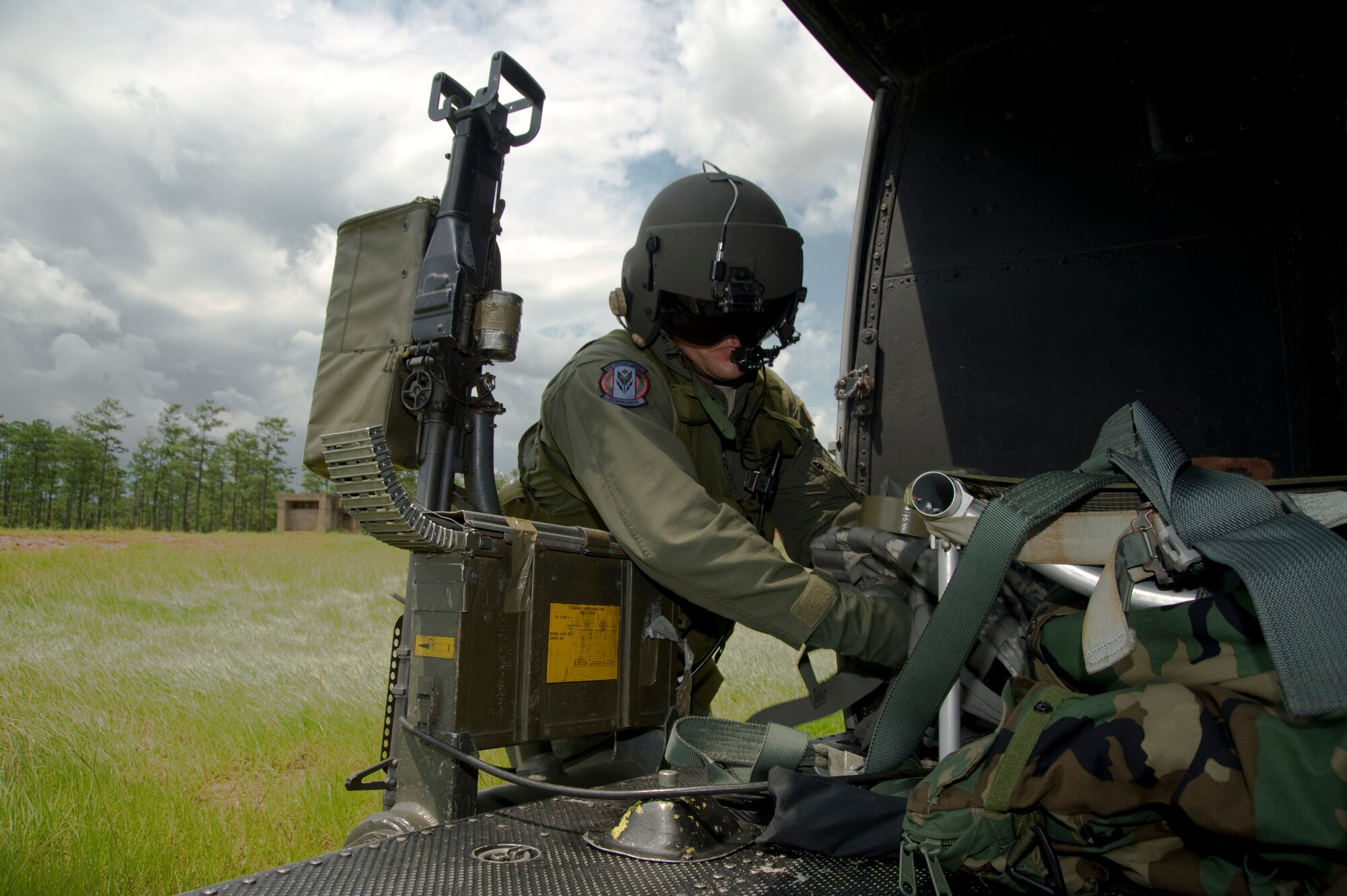 U.S Air Force Chief Master Sgt. Daniel Leick, a combat aviation adviser of 6th Special Operations Squadron, checks for brass inside a UH-1N Huey in Navarre, Fla., Aug. 13, 2012. A principal mission objective in all operating arenas is facilitating the availability, reliability, safety and interoperability of participating foreign aviation resources supporting joint and combined operations. (U.S. Air Force Photo/Airman 1st Class Naomi M. Griego)