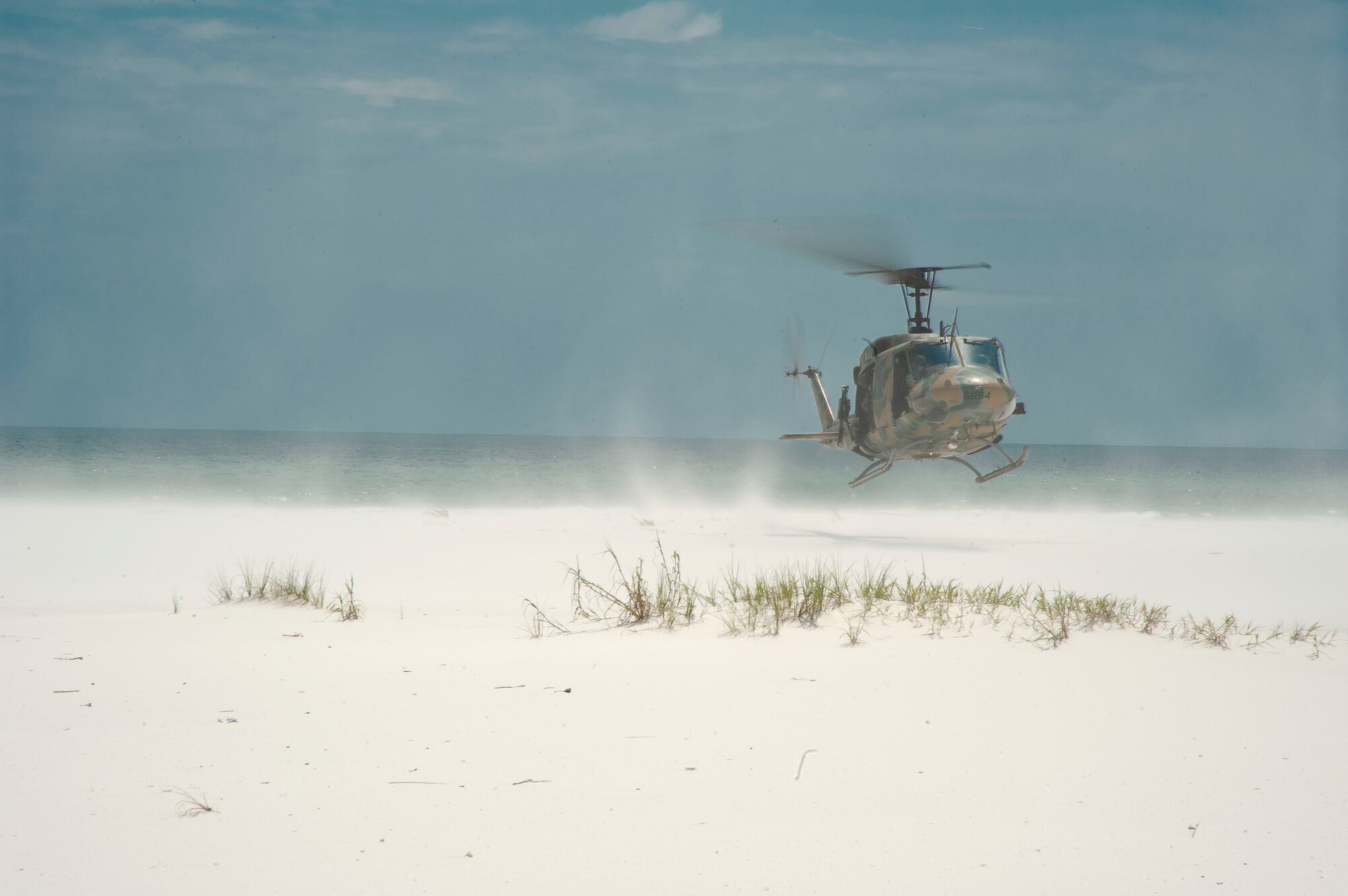 A U.S. Air Force UH-1N Huey lands on a beach in Navarre, Florida on Aug. 13, 2012.  The 6th Special Operations Squadron flies the aircraft in support of their mission of combat aviation advisory. (U.S. Air Force Photo/Airman 1st Class Naomi M. Griego) 