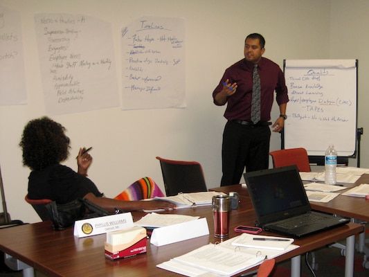 NASHVILLE, Tenn. — Joseph D. Tober, a human resources specialist with the regional CPAC in Chicago, and Phyllis Williams, a human resources specialist with the U.S. Army Corps of Engineers Detroit District, work on ideas for customer service improvement during a Customer Service Improvement Project and Supervisors Conference, Aug. 7, 2012. The conference was comprised of human resources personnel throughout the U.S. Army Corps of Engineers Great Lakes and Ohio Rivers Division.