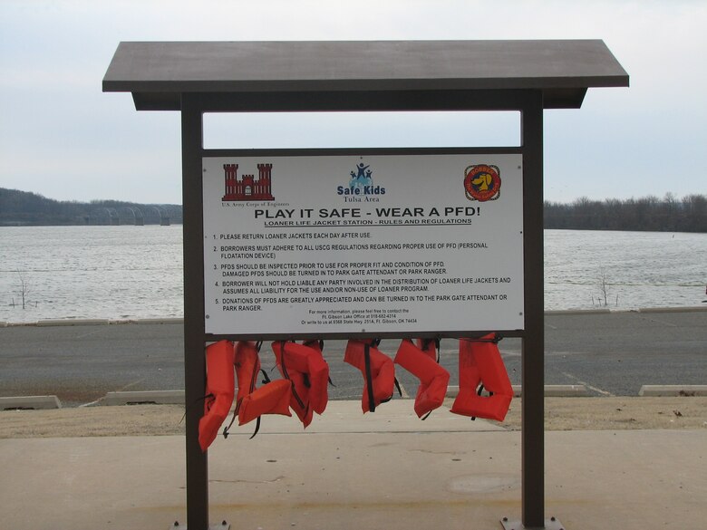 Families can borrow life jackets from the life jacket loaner board at the Taylor Ferry swim beach on Fort Gibson Lake.