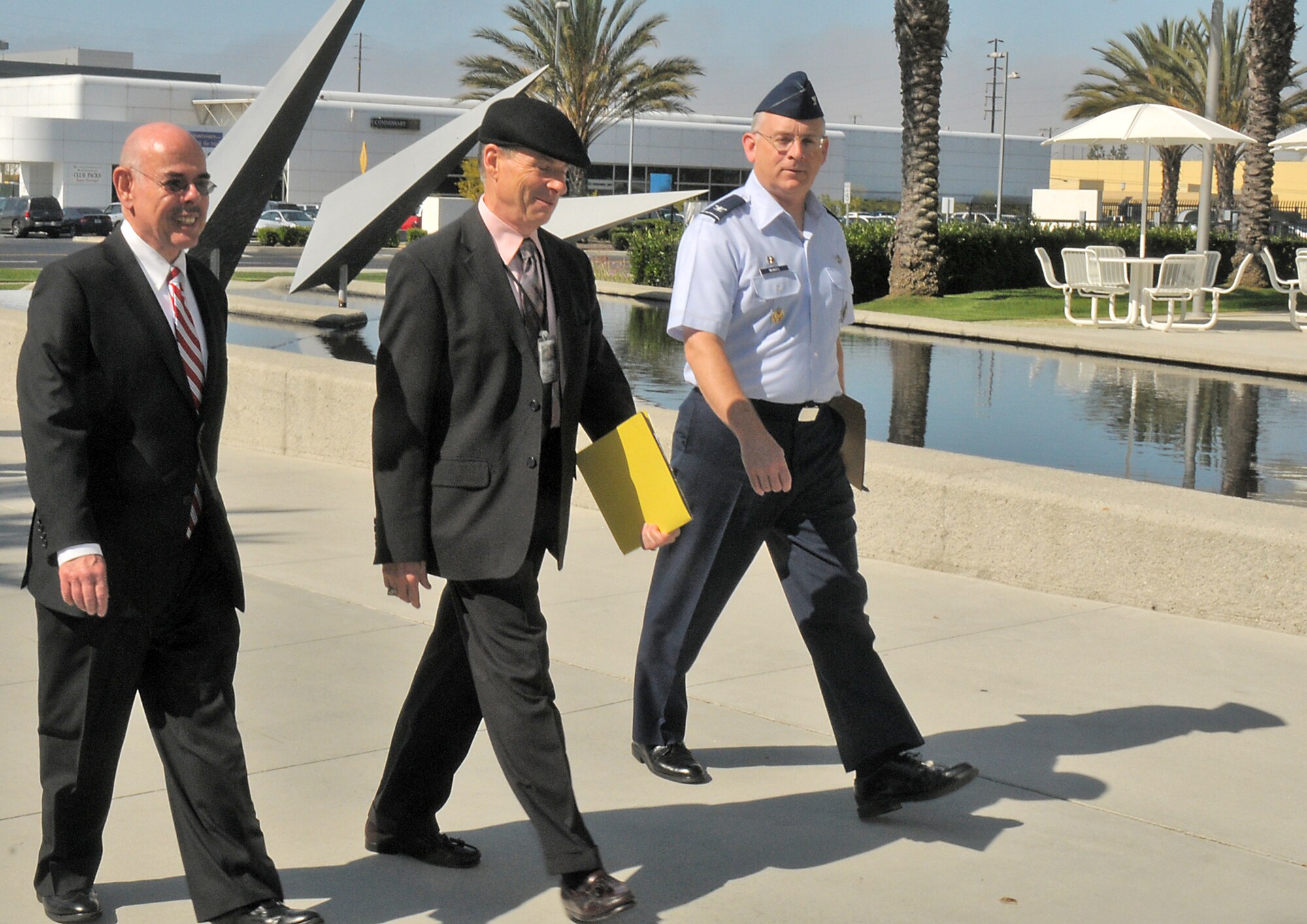 Congressman Henry Waxman; Douglas Loverro, Space and Missile Systems Center executive director, and Col. Samuel McNiel, 61st Air Base Group commander, tour the Schriever Space Complex, Aug. 6. The ranking member of the House Energy and Commerce committee, the congressman was on base to get an overview of Los Angeles Air Force Base and SMC.   His district covers West Los Angeles, Northridge and Agoura Hills. (Photo by Joe Juarez)