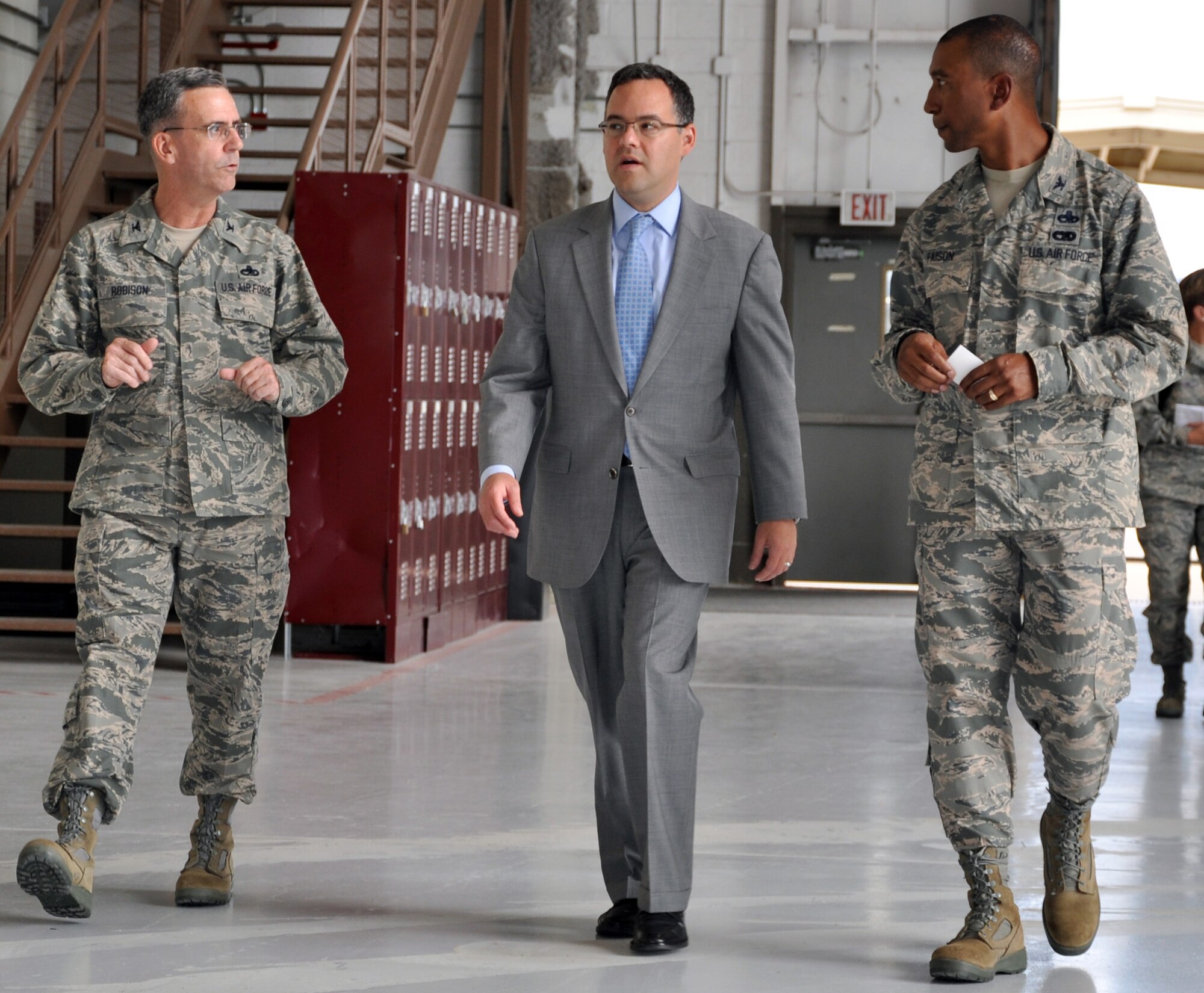 Col. Donald Robison, 931st Air Refueling Group Deputy Commander of Maintenance, and Col. Eric Faison, 22nd Maintenance Group Commander, escort The Honorable Daniel B. Ginsberg, Asisstant Secretary of the Air Force for Manpower and Reserve Affairs, on a tour of the McConnell Air Force Base Total Force Maintenance Facility, Aug. 17, 2012.  Ginsberg spent the day visiting several facilities on base and meeting with members of Team McConnell.  (U.S. Air Force photo by 1st Lt. Zach Anderson)