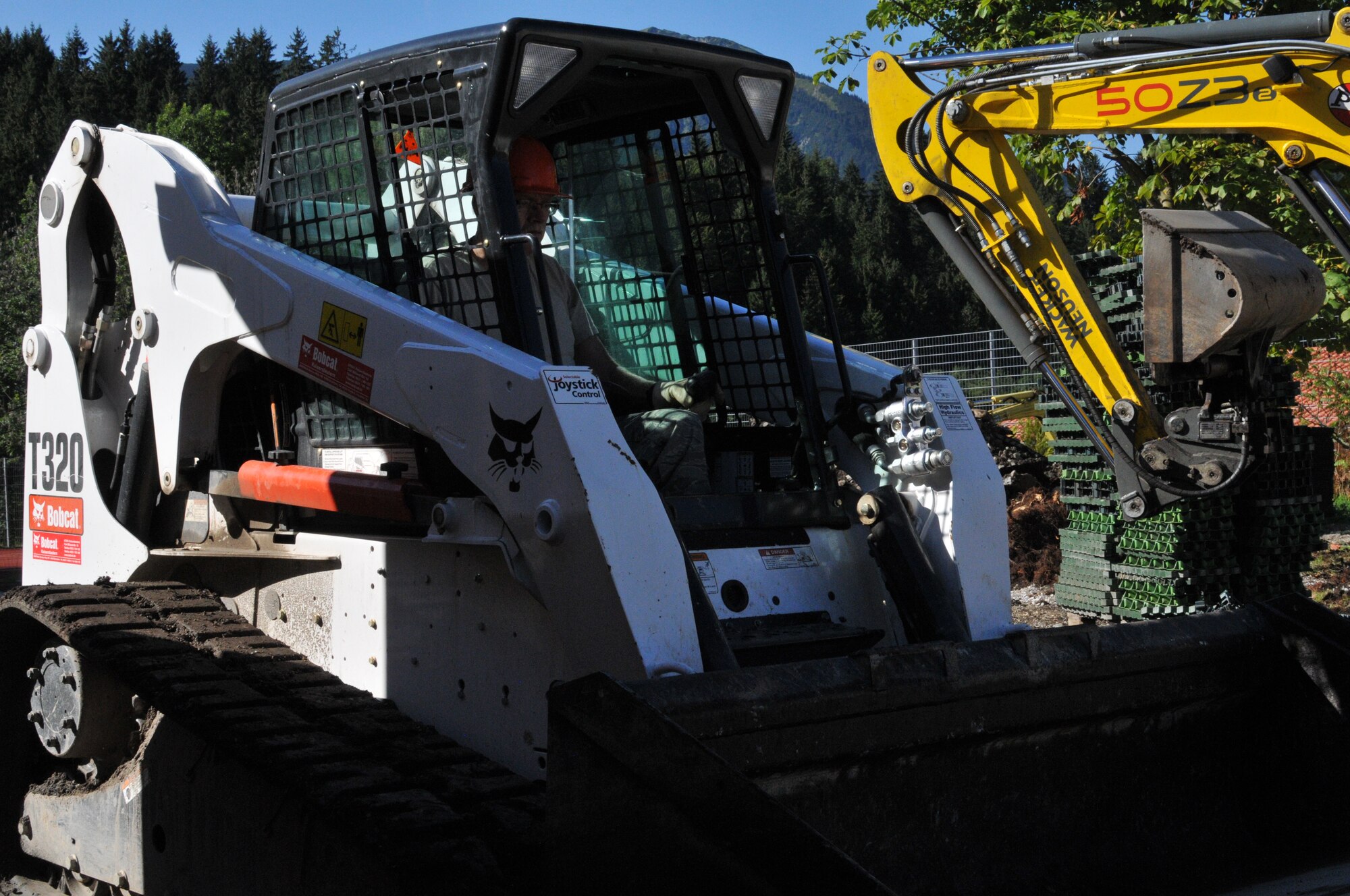 Wyoming Air National Guard’s Staff Sgt. Terry Creekmore, 153rd Civil Engineer Squadron, works on the recreation center site at the NATO School Aug. 17, 2012, in Oberammergau, Germany. Airmen from the 153rd CES are putting their skills to work as they conduct their annual training. (U.S. Air Force photo by Staff Sgt. Natalie Stanley)