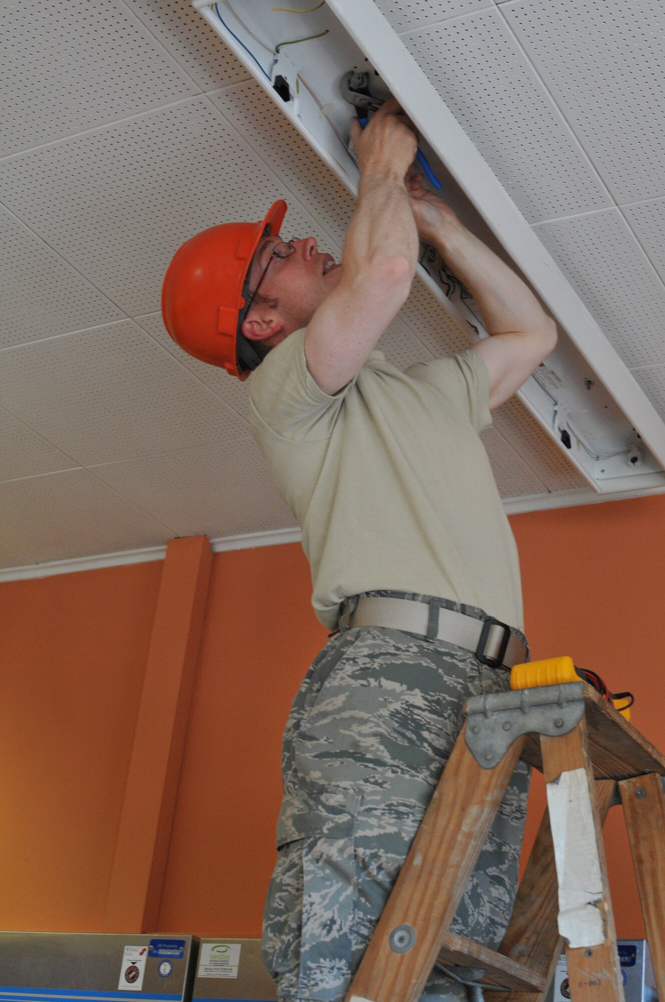 Wyoming Air National Guard’s Master Sgt. Frank Wilson, 153rd Civil Engineer Squadron, works on an electrical project at the NATO School recreation center site Aug. 17, 2012, in Oberammergau, Germany. Airmen from the 153rd CES are putting their skills to work as they conduct their annual training. (U.S. Air Force photo by Staff Sgt. Natalie Stanley)