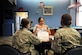 Master Sgt. Sylvia Dieble, 1st Helicopter Squadron superintendent, educates and mentors junior enlisted Airmen at  a Speed Mentoring forum held at The Club at Andrews Aug. 16, 2012. Junior enlisted members were able to spend seven minutes at each table and bring their challenges and questions to leadership. (U.S. Air Force photo/Senior Airman Amber Russell) 