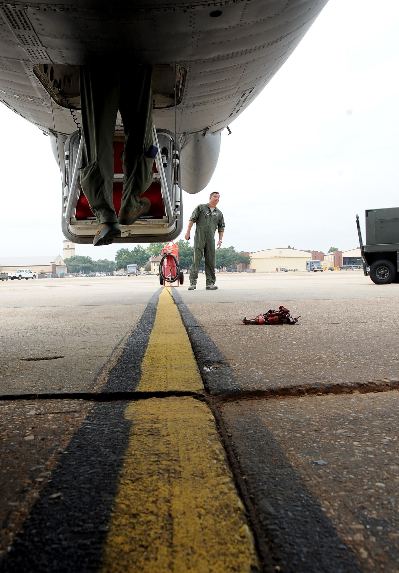 An aircrew member enters a B-52H Stratofortress on Barksdale Air Force Base, La., Aug. 15. Aircrews from Barksdale participated in Exercise Combat Hammer, which evaluated the employment of precision guided munitions to ensure the weapons are fully functional and mission capable. The exercise tested aircrews, munitions and maintenance Airmen on their performance. (U.S. Air Force photo/Staff Sgt. Amber Ashcraft)(RELEASED)