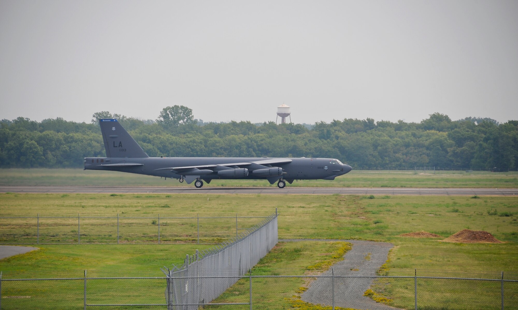 A B-52H Stratofortress rolls down the runway on Barksdale Air Force Base, La., Aug. 15. Aircrews from Barksdale participated in Exercise Combat Hammer, which evaluated the employment of precision guided munitions to ensure the weapons are fully functional and mission capable. The exercise tested aircrews, munitions and maintenance Airmen on their performance. (U.S. Air Force photo/Airman 1st Class Micaiah Anthony)(RELEASED)
