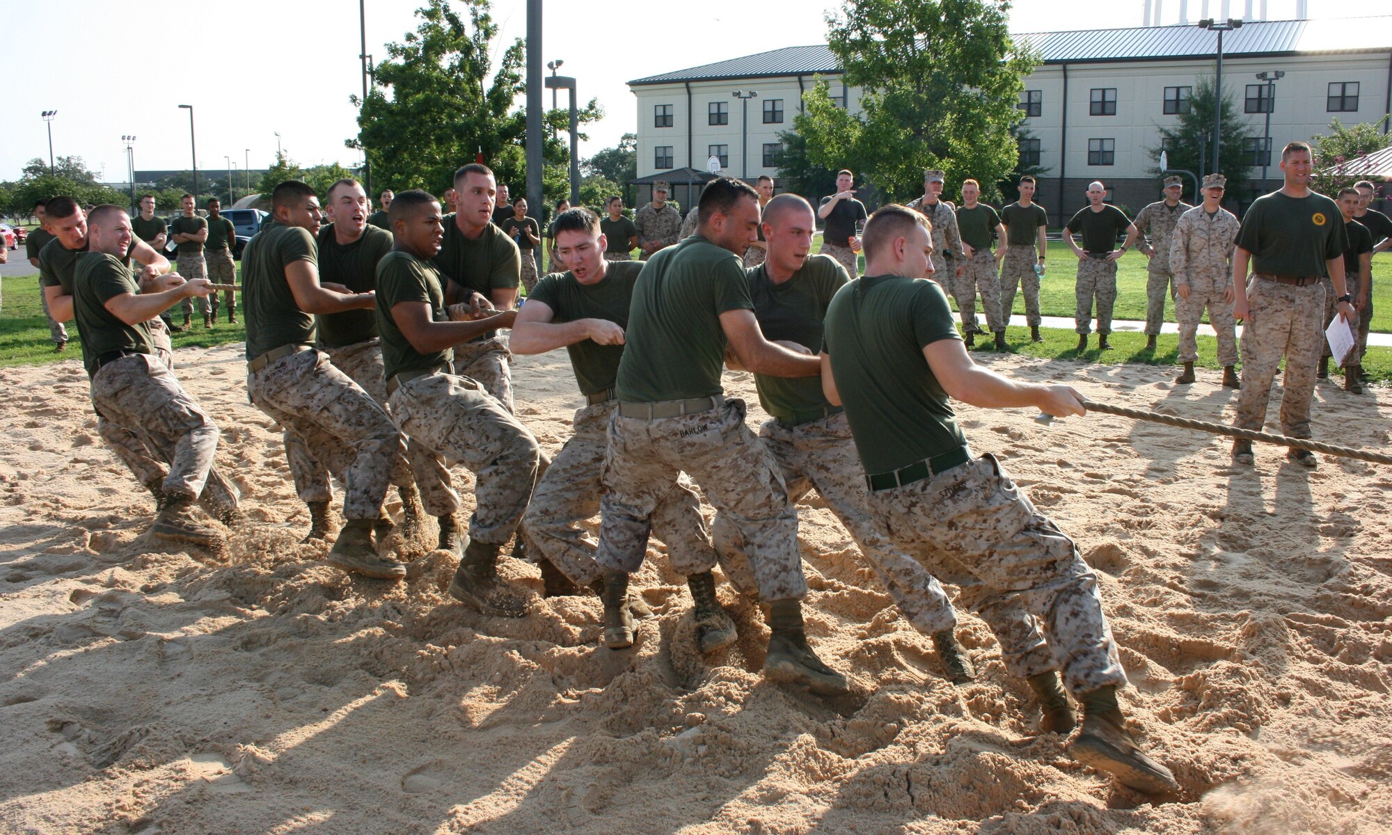A team of Marines from the general purpose calibration and maintenance school compete in the tug-of-war competition at the Keesler Marine Corps Detachment Field Meet Aug. 3, 2012, at the Triangle track, Keesler Air Force Base, Miss.  The Marine Corps regularly organizes events like these to build unit cohesion and camaraderie.   (U.S. Marine Corps photo by Marine Staff Sgt. Christopher Lambert)
