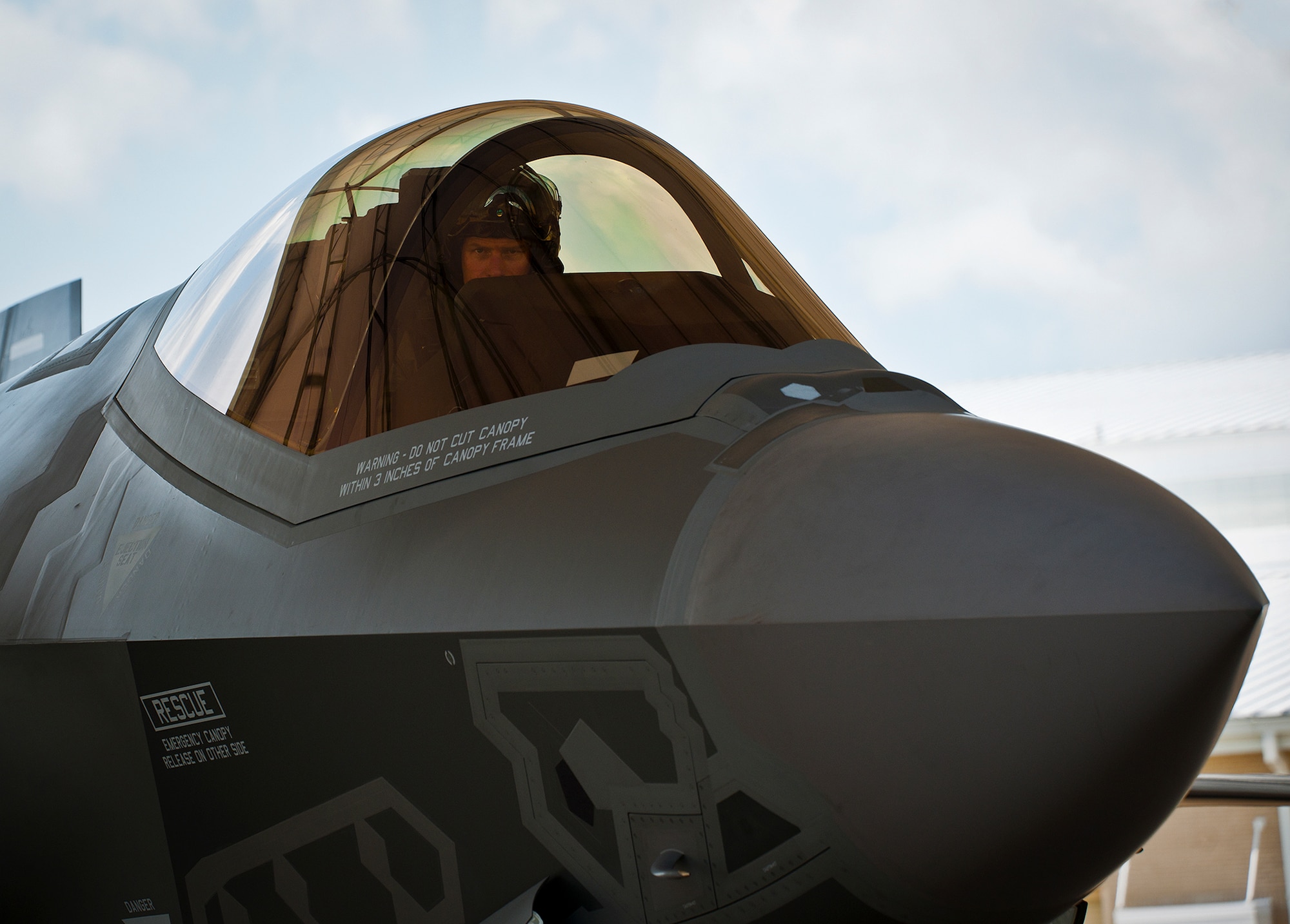 Lt. Col. Lee Kloos, the 58th Fighter Squadron commander, waits for the maintenance team to secure the F-35A Lightning II joint strike fighter before starting shutdown procedures after a sortie at Eglin Air Force Base, Fla., Aug. 16.  Kloos’ flight marked the 100th A-variant sortie flown from Eglin.  Kloos, an instructor pilot on the F-35, flew the two-ship mission with Col. Andrew Toth, the 33rd Fighter Wing commander, as one of Toth’s F-35 familiarization training flights.