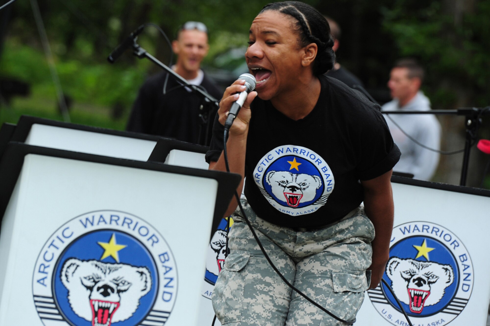 JOINT BASE ELMENDORF-RICHARDSON, Alaska --  Staff Sgt. Chrystal Downs, 9th Army Band, of Atlanta, Ga., performs during the culmination of organizational festivities for 2d Engineer Brigade Soldiers and their Families called Arctic Trailblazer Week, Friday, Aug. 10, 2012.  Arctic Trailblazer Week finished off with a brigade picnic, food, games, music and awards for individuals, groups and the Best Battalion Cup.  (U.S. Air Force photo by Justin Connaher)