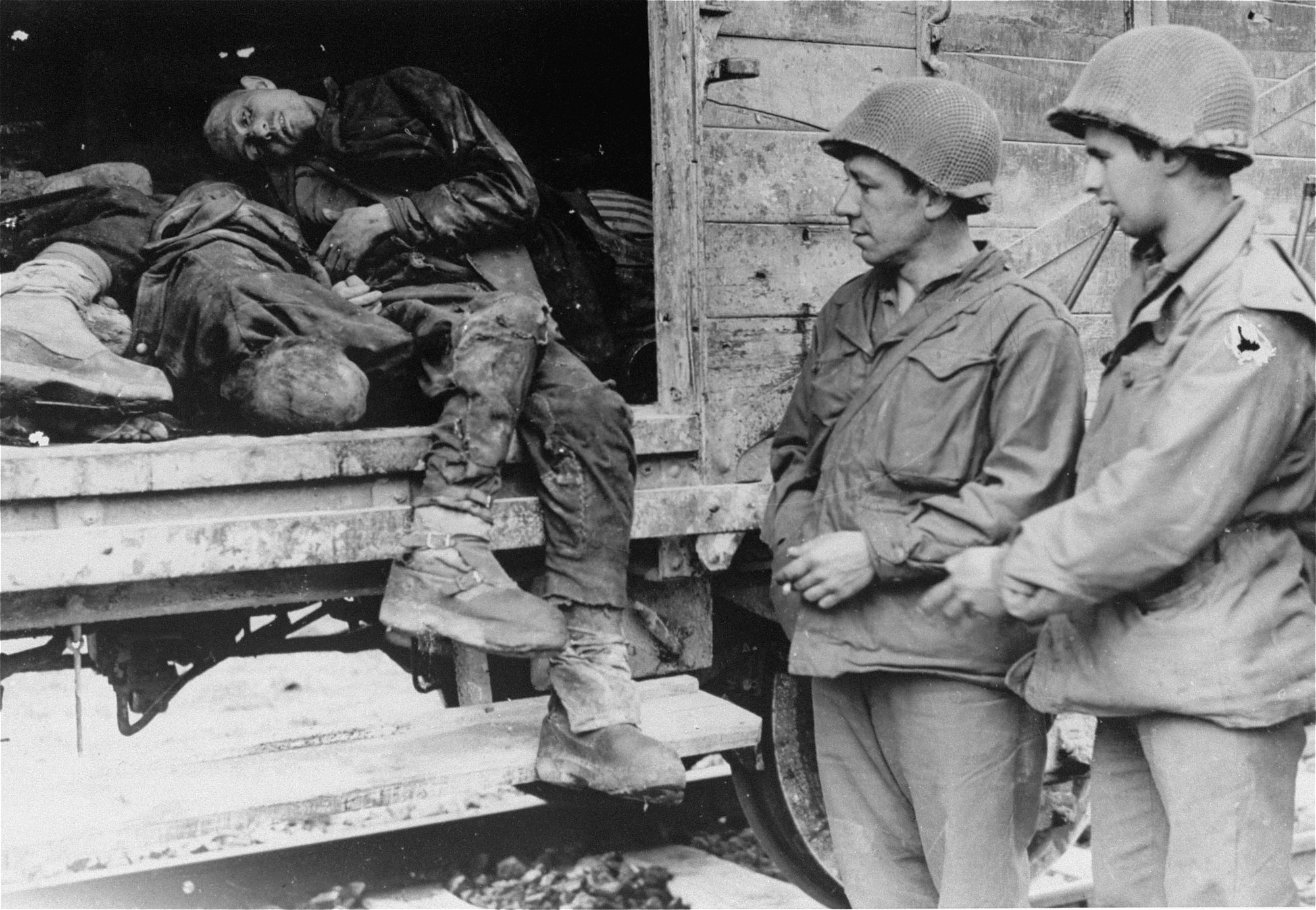 DACHAU, GERMANY – Shortly after Dachau’s liberation, American soldiers view the bodies inside one of the open railcars.  Today, the U.S. Air Force educates all Airmen about how to intervene in small and large-scale situations to prevent the type of bystander behavior that allowed places like Dachau to exist.  (Photo courtesy of the United States Holocaust Memorial Museum/Eric Schwab)