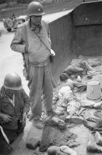 DACHAU, GERMANY – Shortly after Dachau’s liberation, American soldiers view the bodies inside one of the open railcars.  Today, the U.S. Air Force educates all Airmen about how to intervene in small and large-scale situations to prevent the type of bystander behavior that allowed places like Dachau to exist.  (Photo courtesy of the United States Holocaust Memorial Museum/Eric Schwab)