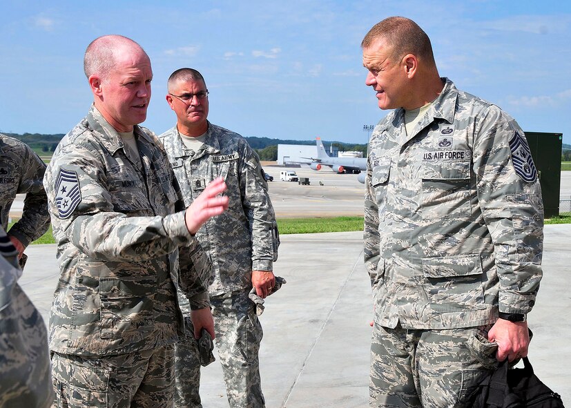 Chief Master Sgt, U.S. Air Force James Roy (right) and Command Chief Master Sgt, Air National Guard, Chief Christopher Muncy take a moment to converse during thier visit to McGhee Tyson Air National Guard Base, Tennessee Jul 17, 2012. 