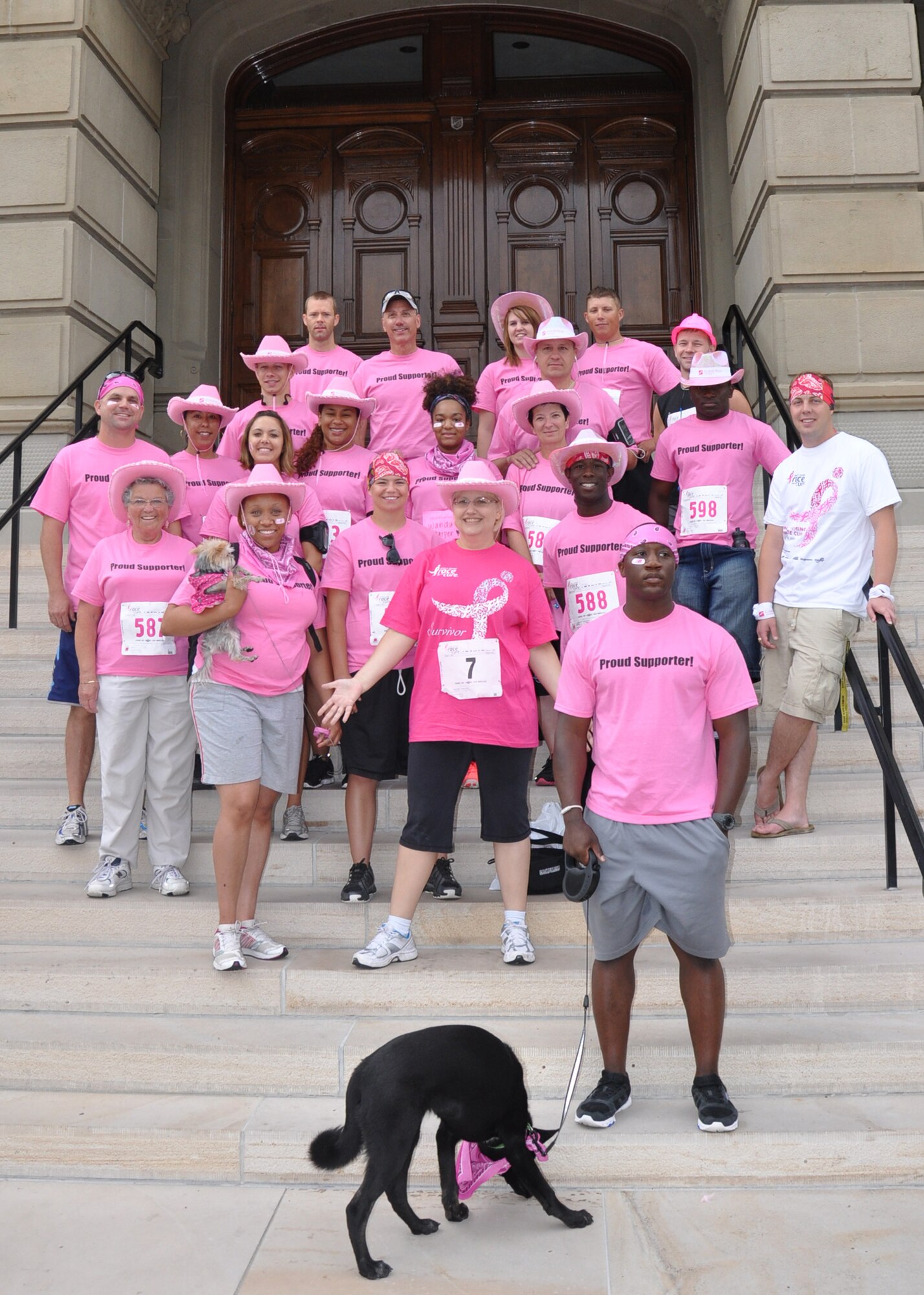 Maj. Christine Millard, 90th Comptroller Squadron commander, and breast cancer survivor, poses on the steps of the Wyoming State Capital with members of the 90th CPTS and 90th Missile Wing staff Aug 11 before participating in the Cheyenne Race for the Cure. (U.S. Air Force photo by Senior Airman Dan Gage)