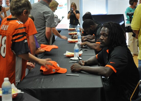 WRIGHT-PATTERSON AIR FORCE BASE, Ohio – 445th Airlift Wing reservists and their families had the opportunity to meet with Cincinnati Bengals cornerback Adam Jones and his fellow teammates Jermaine Gresham, Geno Atkins plus Eric Ball, the director of player relations and Marvin Lewis, the head coach of the team, at the Community and Airman Center here Aug. 6. (U.S. Air Force photo/Stacy Vaughn)