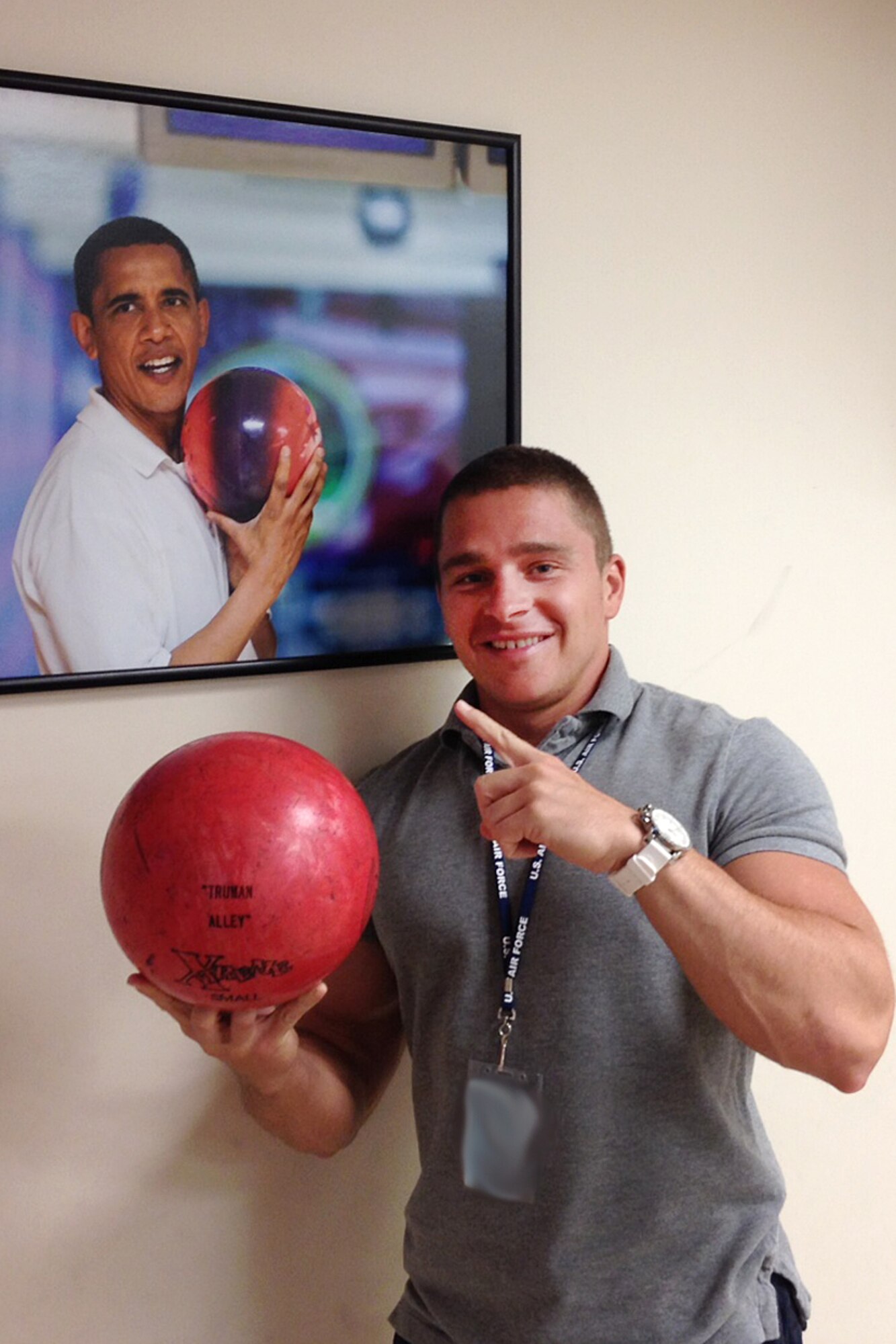WASHINGTON D.C. -- Senior Airman Brooks Payette poses in the White House bowling alley during a break from his recent internship July 10. Brooks recently completed the White House internship in the Office of Public Engagement and Intergovernmental Affairs. (National Guard photo by Tech. Sgt. Mark Wyatt/RELEASED)