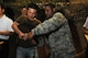 Staff Sgt. Frank Simpson, right, 8th Security Forces Squadron trainer, helps Park Ki Hong, Gunsan City Police Department security section, load a weapon simulator before taking part in a training scenario on Kunsan Air Base, Republic of Korea, Aug. 10, 2012. Members from the Gunsan City Police Department were given a demonstration and tour of a firearms training simulator, which many defenders across the military use to train. (U.S. Air Force photo/Senior Airman Jessica Hines)