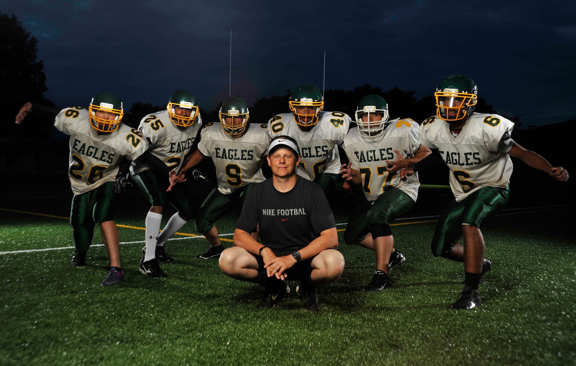 From left to right Edgren High School football team captains seniors Chris Finco, Khalil Williams, Joel Loy, junior Louis Murphy, senior Spencer Robison, and junior Tristan Jefferson along with head coach Blaine Miller come together for a group photo at Misawa Air Base, Japan, Aug. 15, 2012. Coach Miller has designated these six players to be team captains for the game against Yokota Aug. 24, 2012. (U.S. Air Force photo by Airman 1st Class Zachary Kee/Released)