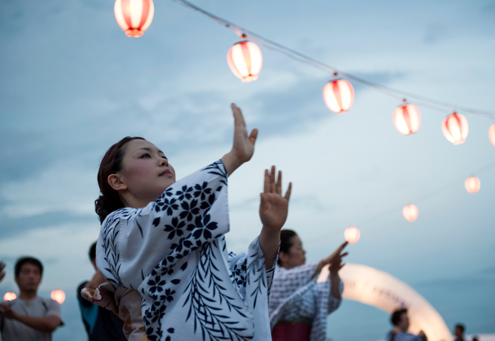 YOKOTA AIR BASE, Japan -- A Japanese woman dances during the 2012 Japanese-American Festival at Yokota Air Base, Aug. 18, 2012. This two-day festival had a wide variety of dance and musical performances entertaining approximately 178,000 visitors. (U.S. Air Force photo by Senior Airman Andrea Salazar) 