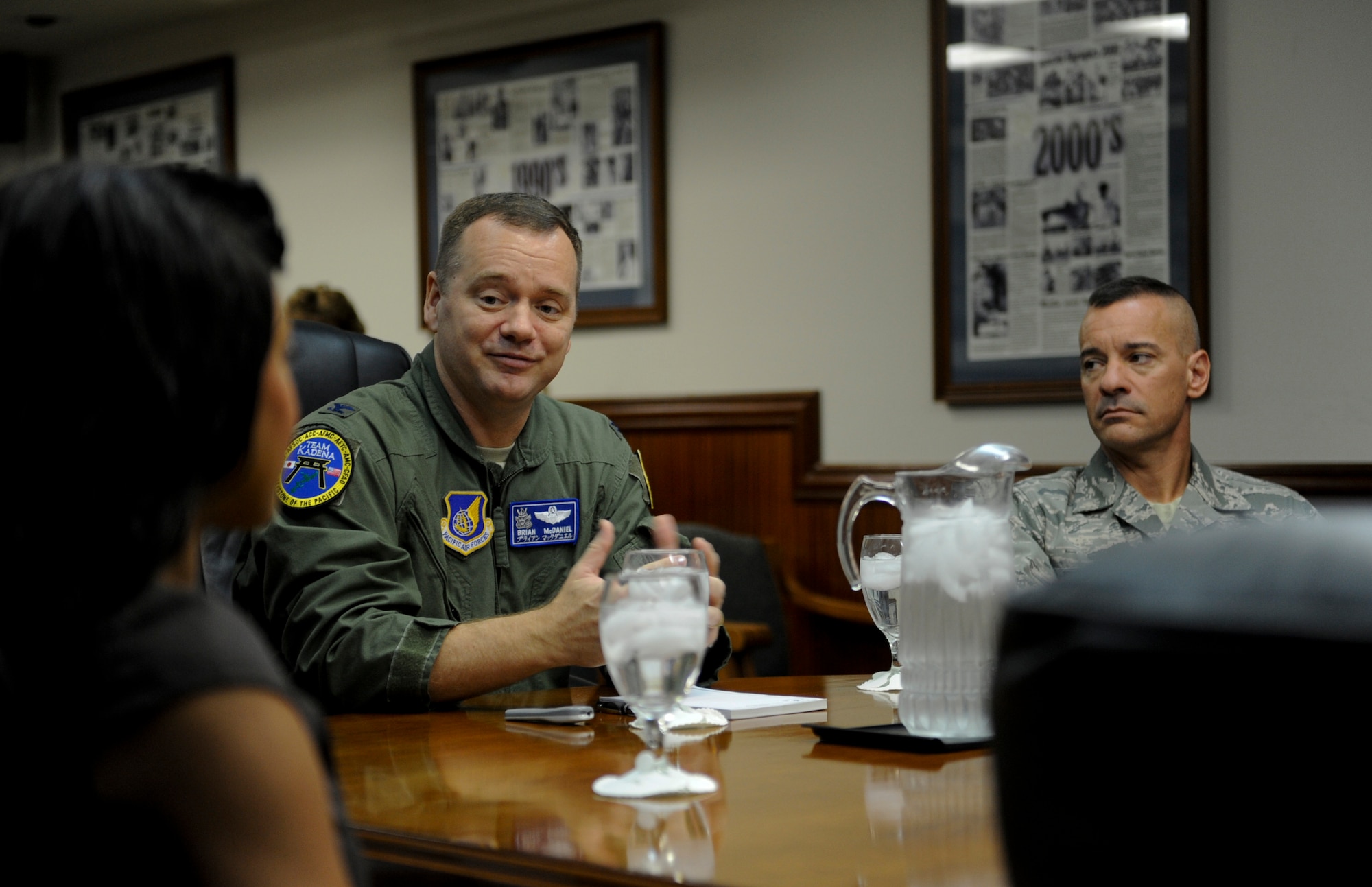 U.S. Air Force Col. Brian McDaniel, 18th Wing vice commander, speaks with former American Idol contestants during an Idols World Tour, Kadena Air Base, Japan, Aug. 17, 2012. The Idols World Tour brings U.S. troops and their families face-to-face with the stars they've seen on TV. (U.S. Air Force photo/Airman 1st Class Justin Veazie)