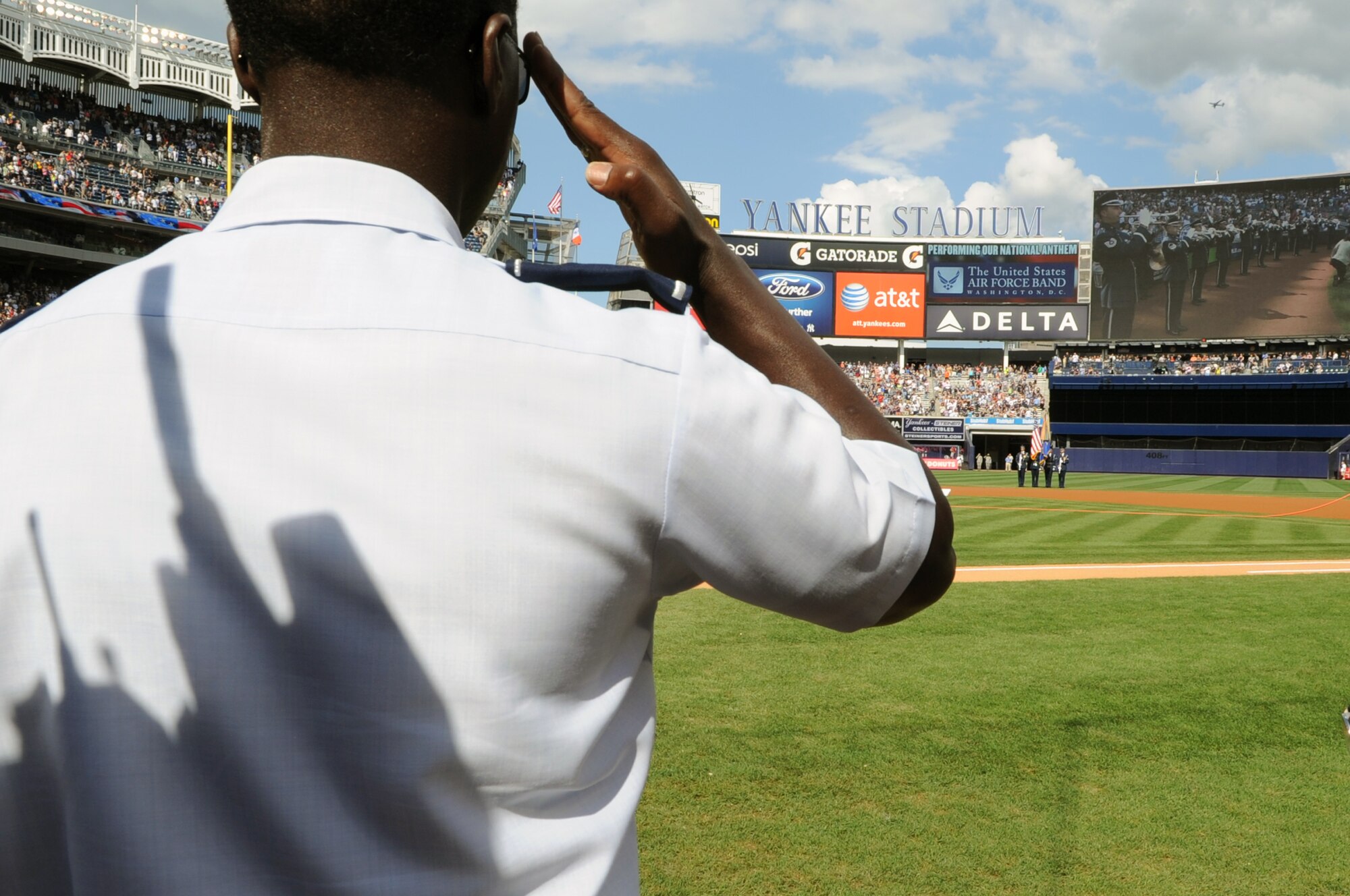 Air Education and Training Command Commander Gen. Edward A. Rice Jr. salutes the colors during the National Anthem for the Yankees vs. Red Sox game Aug. 18 at the Yankee Stadium, Bronx, N.Y. The U.S. Air Force Band and U.S. Air Force Honor Guard performed during the opening ceremony, kicking off their participation in Air Force Week 2012. (U.S. Air Force photo by Senior Airman Tabitha N. Haynes) 