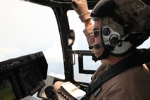 Capt. Matthew Wilckens, Marine Aircraft Group 26 special projects officer, pilots an MV-22B Osprey during a demonstration for Japanese officials, Aug. 3. The Marines of MAG-26 and Marine Medium Tiltrotor Squadron 266 demonstrated to the Japanese officials how safe Ospreys are, as well as their capabilities.
