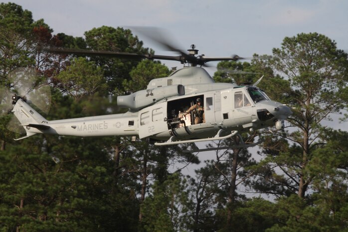 One of Marine Light Attack Helicopter Squadron 269's Hueys takes off from a confined area landing. HMLA0269 Marines conducted training to help the Marines gain proficiency with the latest model of the UH-1, the UH-1Y, Aug. 9.