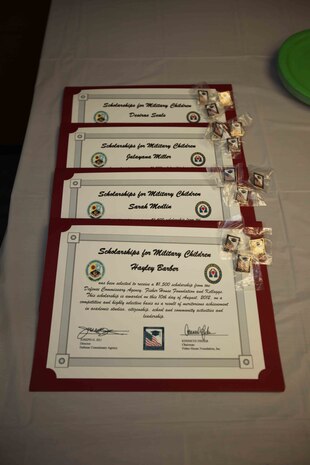 Laid out are the four scholarships awarded by Kellogg’s and Fisher House Foundation and pins for the recipient’s family members. The scholarships were awarded bases on the student’s outstanding academic performance and an essay.
