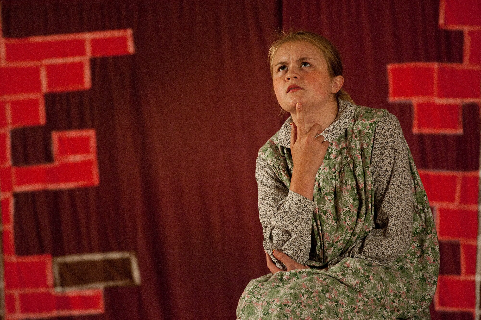 Anna Lee, portraying Mary Lennox, performs during the Missoula Children's Theatre rendition of "The Secret Garden" at the base theater Aug. 18, 2012, at Nellis Air Force Base, Nev. "The Secret Garden," is one of the most well-known novels by Frances Hodgon Burnett. (U.S. Air Force photo by Staff Sgt. Christopher Hubenthal)
