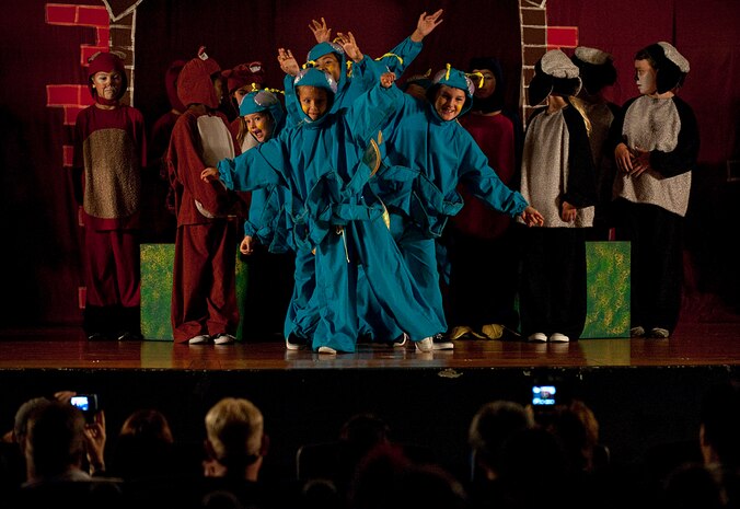 Military family members perform during the Missoula Children's Theatre rendition of "The Secret Garden" at the base theater Aug. 18, 2012, at Nellis Air Force Base, Nev. The children had 5 days to prepare for the performance. (U.S. Air Force photo by Staff Sgt. Christopher Hubenthal)