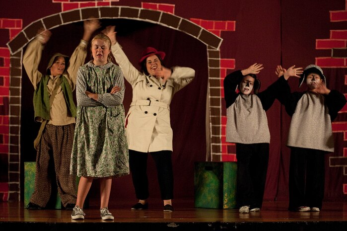 Anna Lee, portraying Mary Lennox, performs during the Missoula Children's Theatre rendition of "The Secret Garden" at the base theater Aug. 18, 2012, at Nellis Air Force Base, Nev. Fifty military family members participated in the production of the play. (U.S. Air Force photo by Staff Sgt. Christopher Hubenthal)