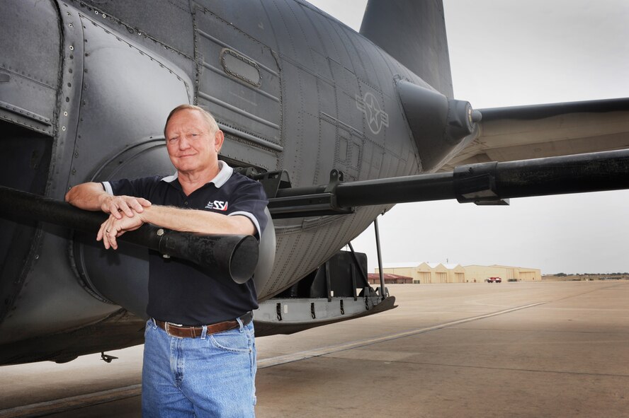 Barry Wilkins, 16th Special Operations Squadron, poses next to an AC-130H Spectre gunship at Cannon Air Force Base, N.M., Aug. 17, 2012.  Wilkins has flown on several models of gunship over past 41 years and educates Airmen on the current systems. (U.S. Air Force photo/Airman 1st Class Xavier Lockley)