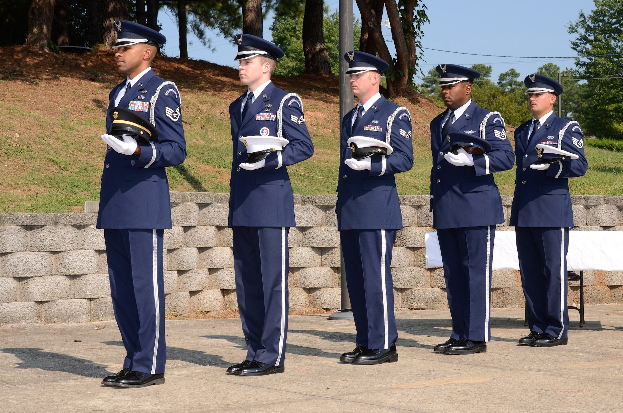 Members of the 94th Airlift Wing Honor Guard perform during a POW/MIA ceremony to honor Col. (ret) Lee Ellis at Dobbins Air Reserve Base, Ga. on Aug 16. The 2012 Honorary Commanders Association visited Dobbins Air Reserve Base as part of their year-long introduction to the military.  (U.S. Air Force photo/Brad Fallin)