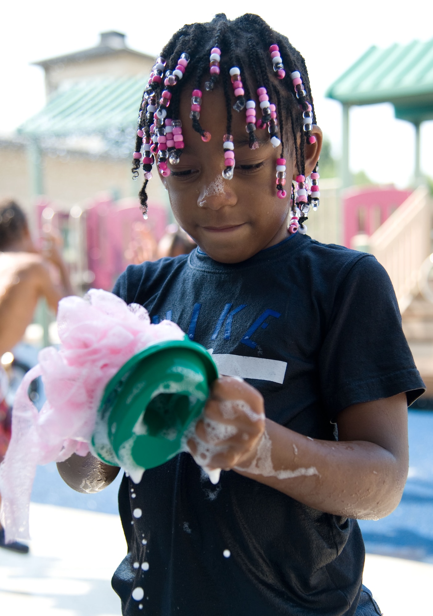 Katelyn Knight plays in the bubble area Aug. 17, 2012, at the Child Development Center on Dover Air Force Base, Del. Weekly prices for the CDC range from approximately $60-140 based on family income. (U.S. Air Force photo by Adrian R. Rowan)