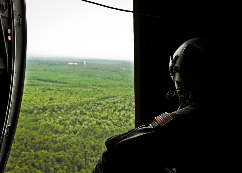 Staff Sgt. Donald McNaron, a loadmaster with the 919th Special Operations Wing, waits for the command to execute an aerial drop during an MC-130E Combat Talon I mission from Duke Field, Fla. The 919th are the only wing in the Air Force that still flies the Talon I.  Over the next several years, the Talons will be phased out of the 919th as it moves to an Aviation Foreign Internal Defense mission.  (U.S. Air Force photo/Tech. Sgt. Samuel King Jr.)