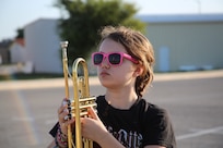 Leigh Witek, Randolph High School band trumpet player, stands ready to march as the band practices in the early morning heat at Randolph, Aug. 14. The band is learning fundamentals of drill to prepare for the upcoming marching season. (U.S. Air Force photo by Rich McFadden) 