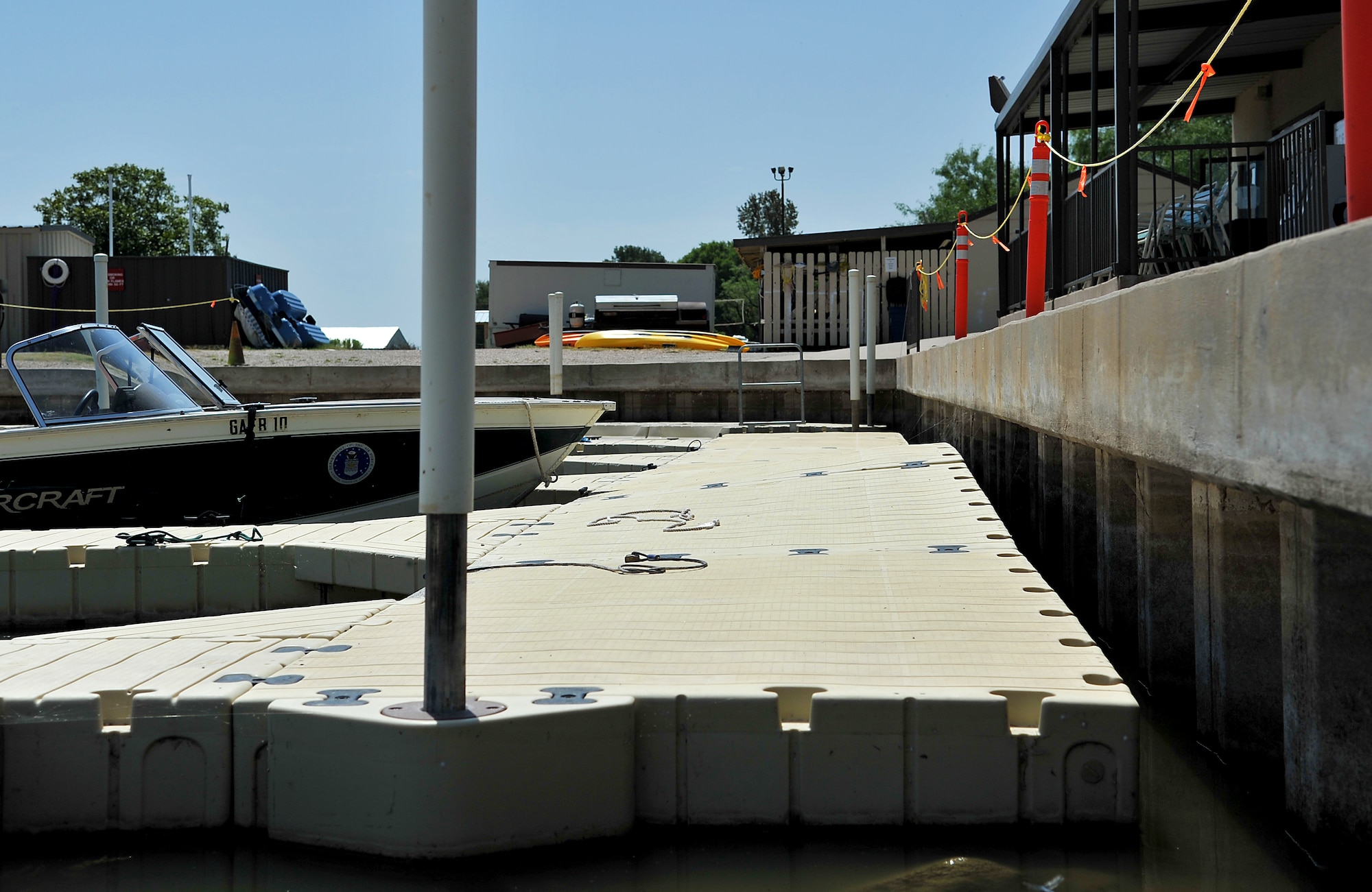 GOODFELLOW AIR FORCE BASE, Texas-- A boat dock at the Goodfellow Recreation Camp bulges upwards from rocks at the bottom of Lake Nasworthy Aug. 16. The water level has dropped approximately 40 inches from the start of summer. (U.S. Air Force photo/ Airman 1st Class Michael Smith)