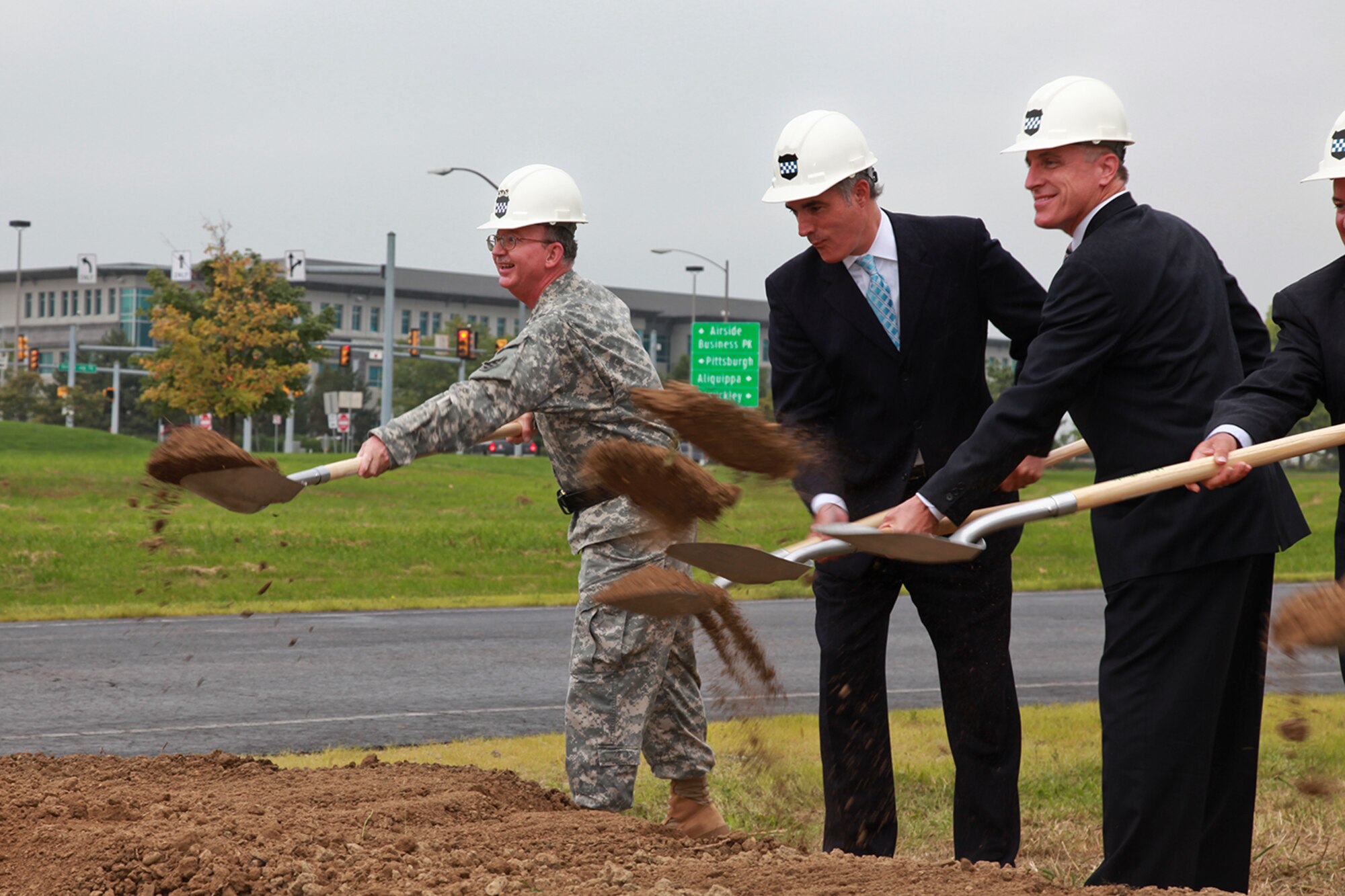 Army Maj. General William D. Razz Waff (left), Commanding General of the 99th Regional Support Command; Sen. Robert P. Casey Jr. (D); and Rep. Tim Murphy (R-18) throw the first few shovels of dirt at the Defense Commissary Agency groundbreaking ceremony held in Coraopolis, Pa, Aug. 18, 2012. The future site of the new 43,000 square-foot DeCA facility will serve more than 168,000 military members, Veterans and their family. The current commissary located at the Charles E. Kelly facility in Oakdale, Pa. will close when the new facility opens in November of 2013. (U.S. Air Force photo by Tech. Sgt. Ralph Van Houtem/Released)