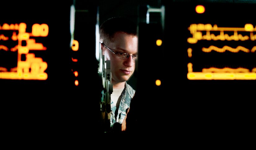 Staff Sgt. Caleb Gibson checks Propaq Encore monitors at Joint Base Andrews, Md., Aug. 15, 2012. Caleb is a biomedical equipment technician assigned to the Medical Logistics Flight of the 779th Medical Support Squadron. (U.S. Air Force photo/Val Gempis)