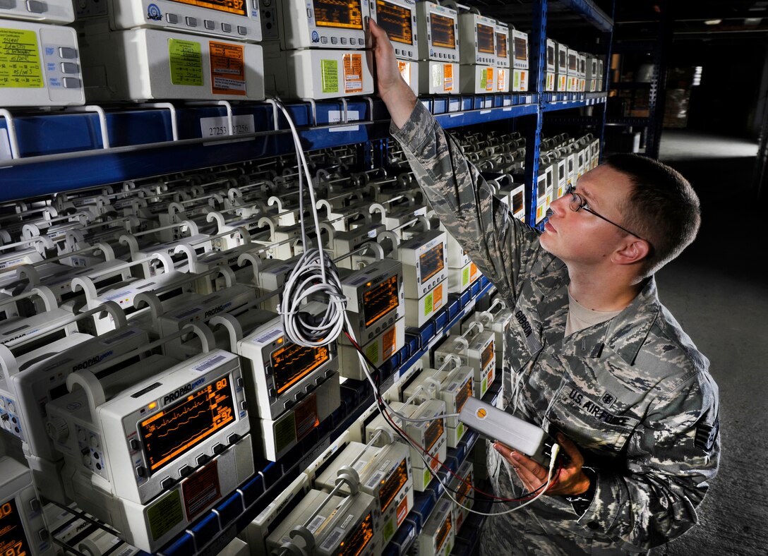 Staff Sgt. Caleb Gibson uses a patient simulator equipment to check Propaq Encore monitors at Joint Base Andrews, Md., Aug. 15, 2012. Gibson is a biomedical equipment technician assigned to the Medical Logistics Flight of the 779th Medical Support Squadron. (U.S. Air Force photo/Val Gempis)